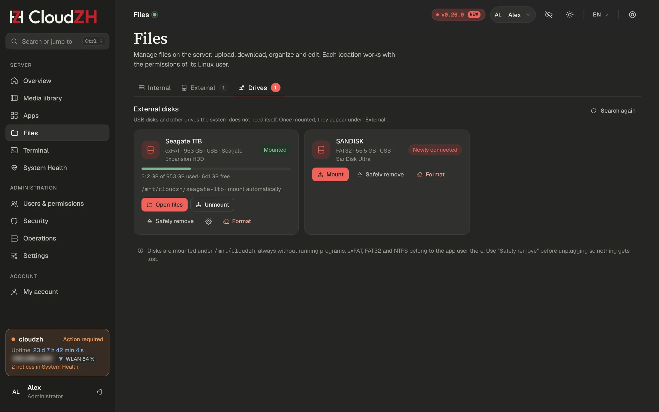 Drives tab with two USB disks, mount, eject and format buttons